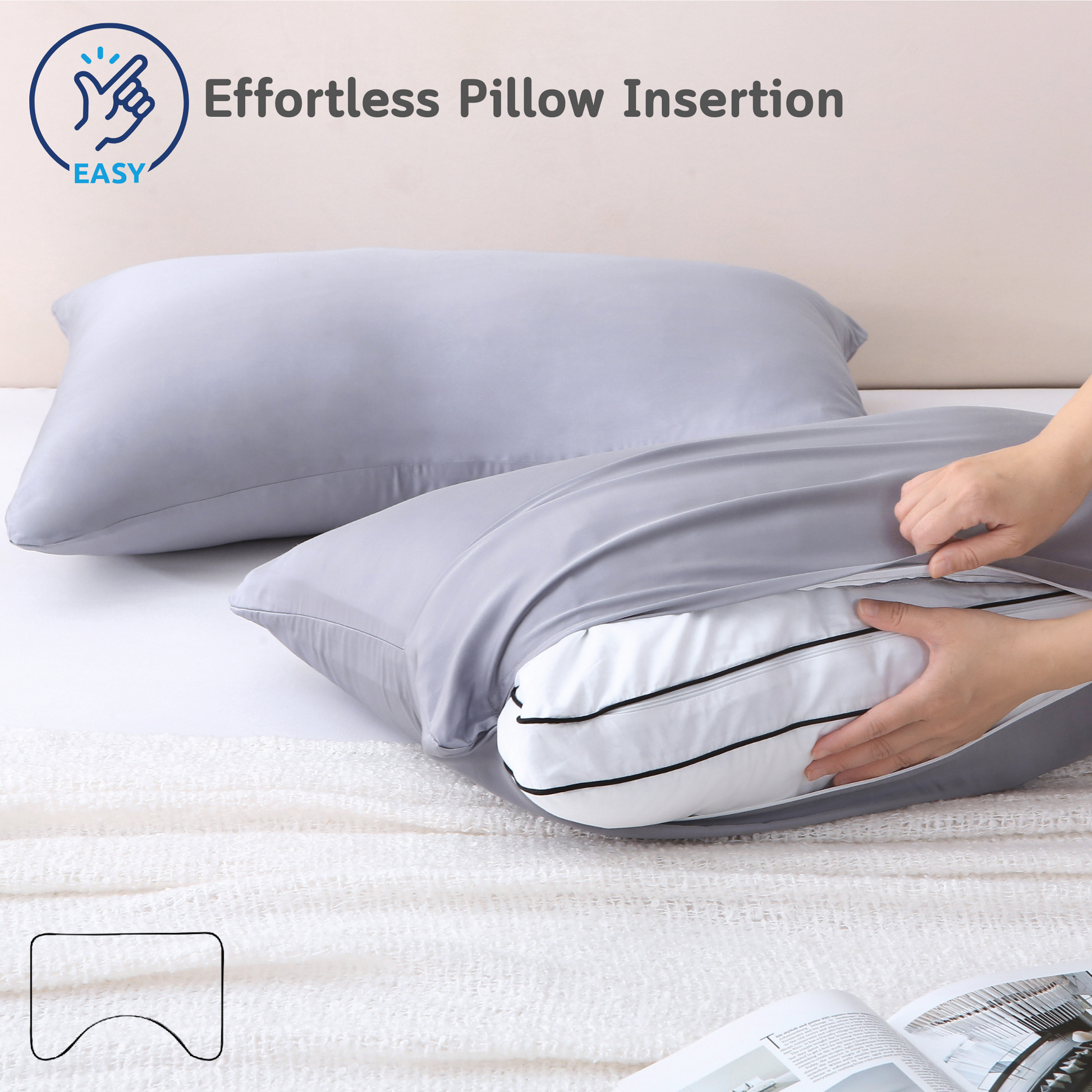 Person inserting a pillow into a gray Cushyz bamboo cooling pillow cover on a bed, featuring a wide side opening for effortless pillow insertion and secure fit, labeled “EASY”.