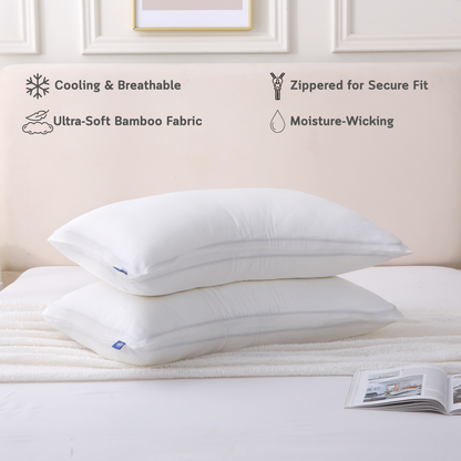 Two curved white Cushyz bamboo cooling pillow covers on pillows in a minimalist bedroom setting, labeled with features: cooling and breathable, ultra-soft bamboo fabric, hidden zipper for secure fit, and moisture wicking.