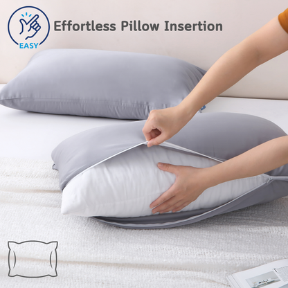 Gray Cushyz bamboo cooling pillow cover with wide side opening, showing easy pillow insertion for a secure fit.
