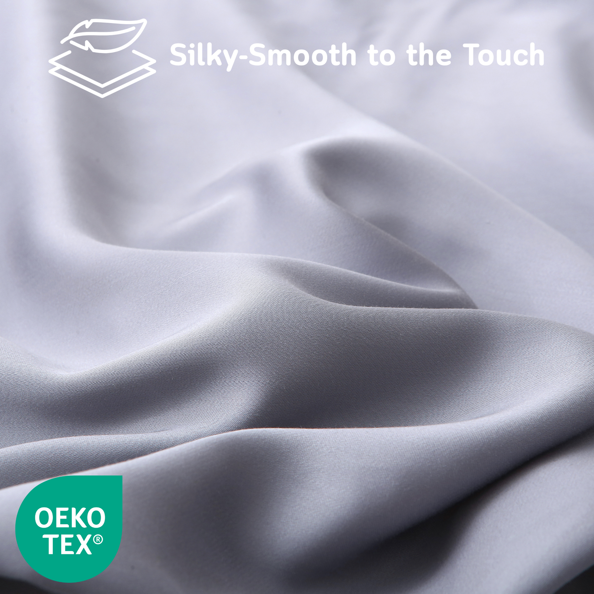 Close-up of gray Cushyz bamboo cooling pillow cover with silky-smooth fabric texture, labeled “Silky-Smooth to the Touch” and featuring OEKO-TEX certified logo.
