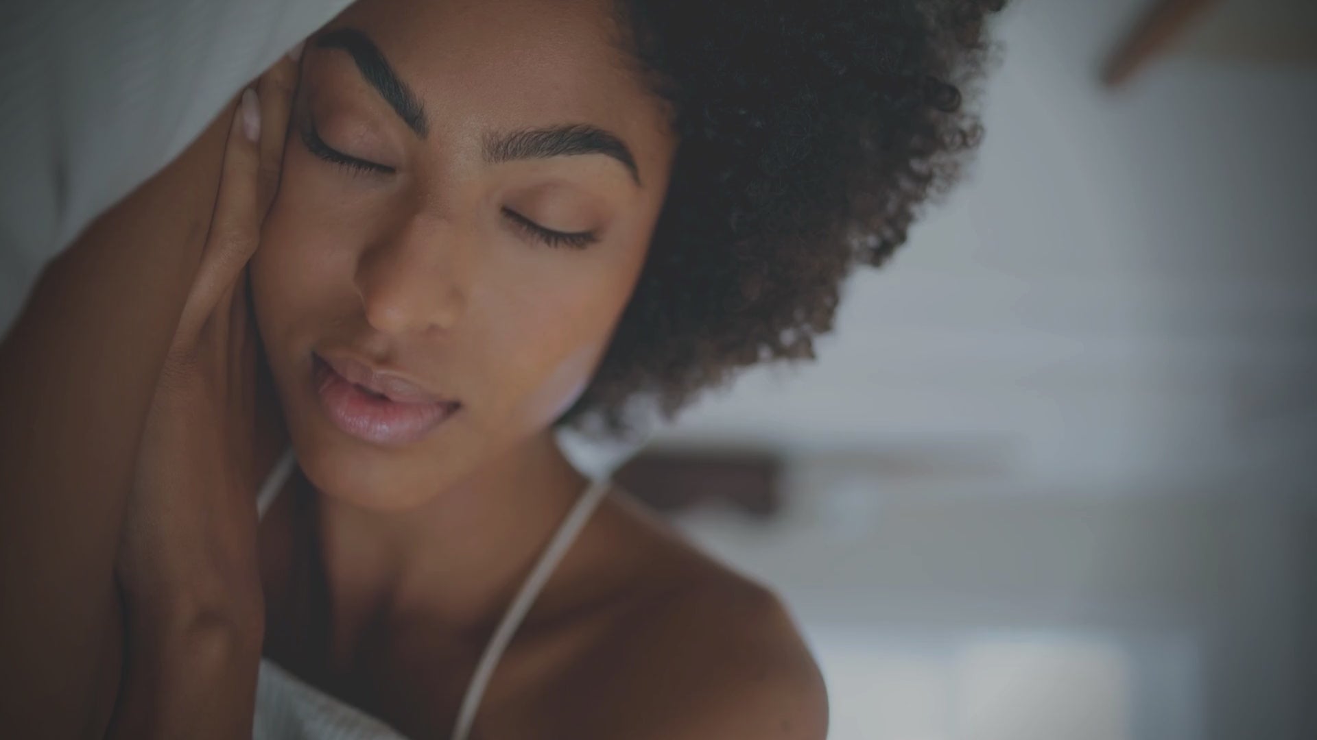 Load video: Short clip showing people enjoying deep sleep on Cushyz luxury bed pillows, including bamboo charcoal memory foam and organic latex options